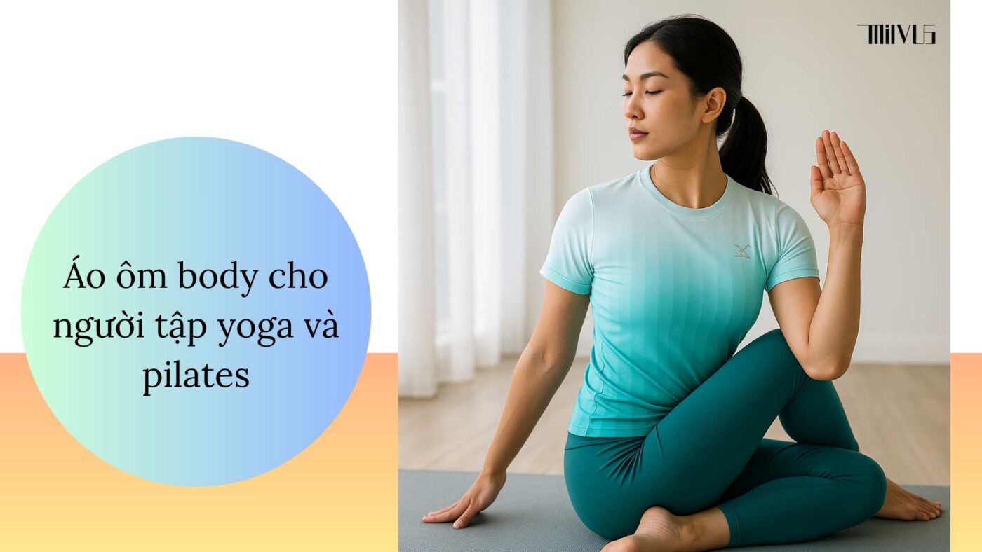 Người mẫu nữ châu Á mặc áo thun thể thao xanh nhạt loang trắng, đang tập yoga trong studio sáng, áo ôm body mang lại sự thoải mái.